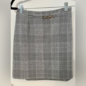 Black and white plaid skirt.  Size M.